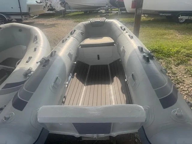Slide: The Image of 2025 Highfield Classic 290 inflatable boat, gray, parked outdoors. - 3