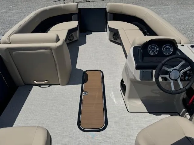 Slide: The Image of 2024 Harris FloteBote 230 Cruiser SLDH interior with beige seating and modern dashboard. - 5