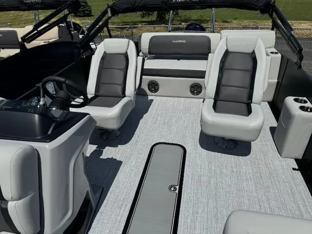 Slide: The Image of 2024 Harris FloteBote 230 Cruiser SLDH interior with plush seating and modern design. - 6