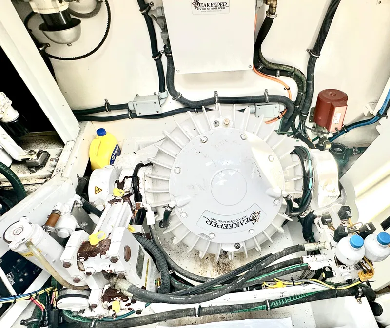 Slide: The Image of Engine room of 1980 Bertram 58 Convertible Custom with Seakeeper stabilizer system. - 33