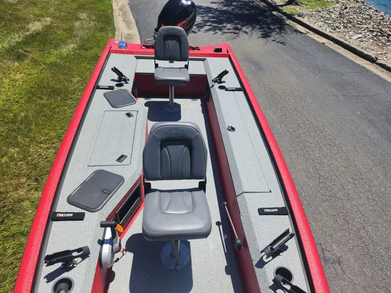 Slide: The Image of 2018 War Eagle 754VS Stick Steer fishing boat with dual seats and storage compartments. - 15