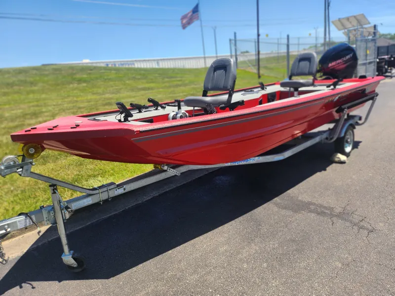 Slide: The Image of 2018 War Eagle 754VS Stick Steer boat on trailer, red color, side view. - 5