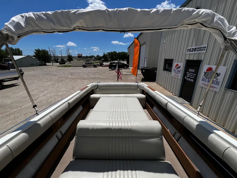 Slide: The Image of 1973 Century Coronado boat with white interior and canopy at Boji Boat Brokers. - 23
