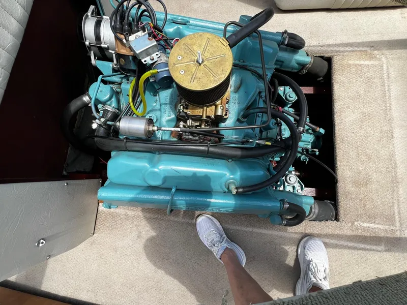 Slide: The Image of 1973 Century Coronado engine compartment with visible engine components. - 31