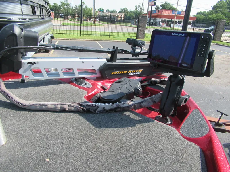 Slide: The Image of 2014 Bass Cat Cougar FTD boat with Minn Kota trolling motor and Lowrance fish finder. - 4