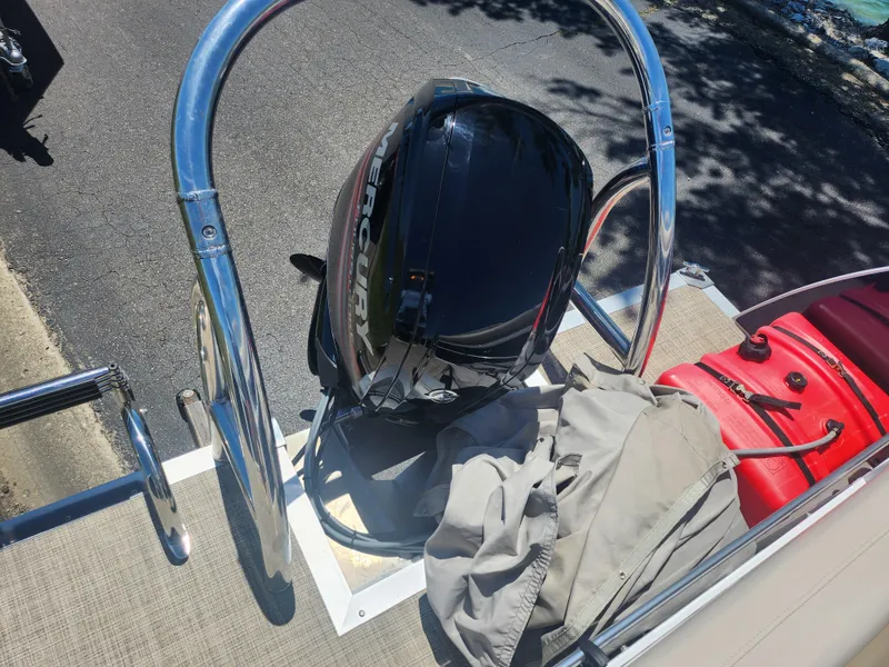 Slide: The Image of 2019 JC 222 Spirit boat with Mercury outboard motor and red fuel tank. - 16