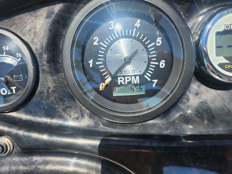 Slide: The Image of Close-up of JC 222 Spirit 2019 dashboard showing RPM gauge. - 21