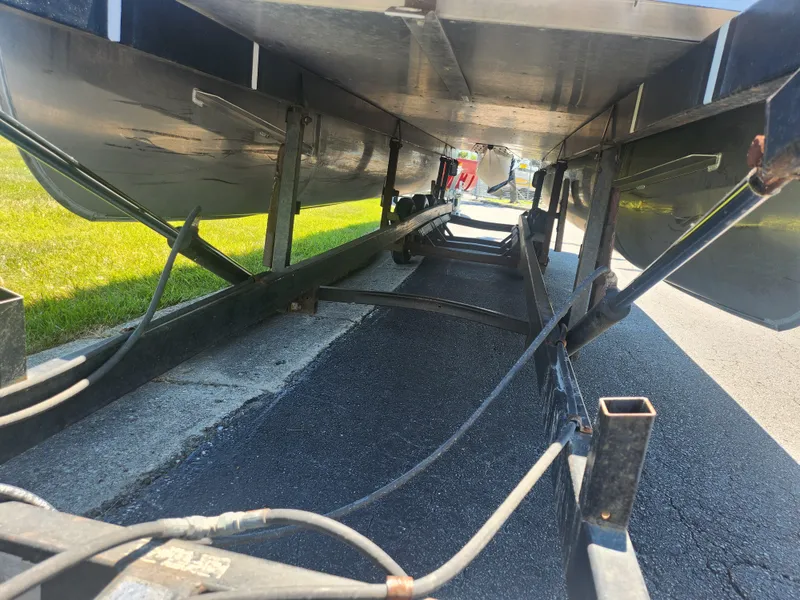 Slide: The Image of Underneath view of a 2019 JC 222 Spirit boat on a trailer. - 6