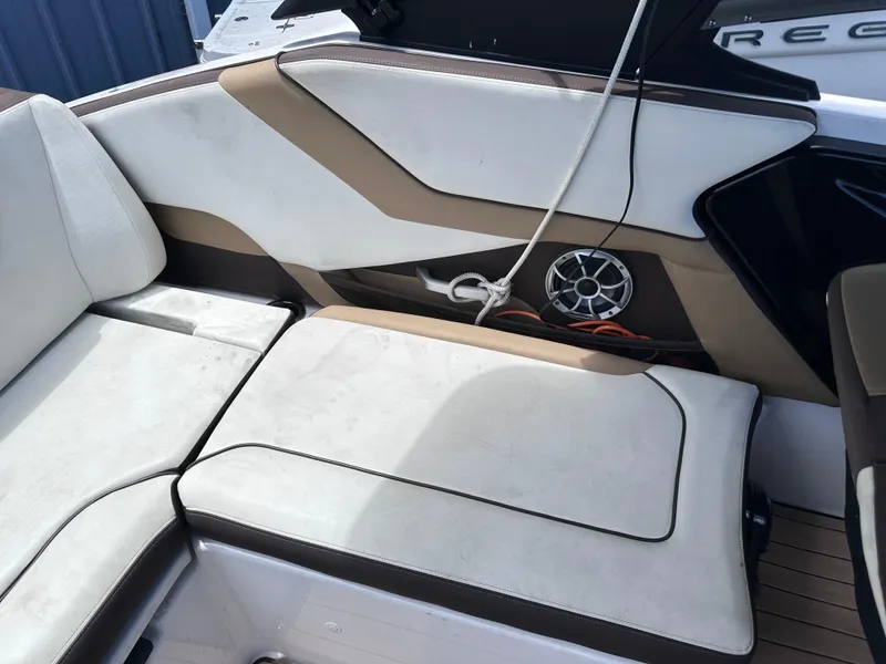 Slide: The Image of 2021 Yamaha Boats 252 SD interior seating and speaker system. - 24