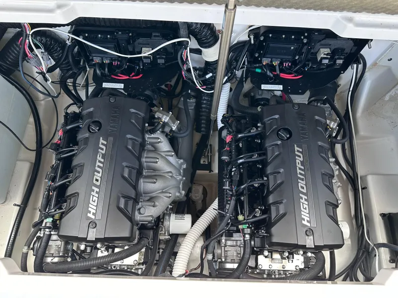 Slide: The Image of 2021 Yamaha Boats 252 SD twin high output engines in engine compartment. - 27