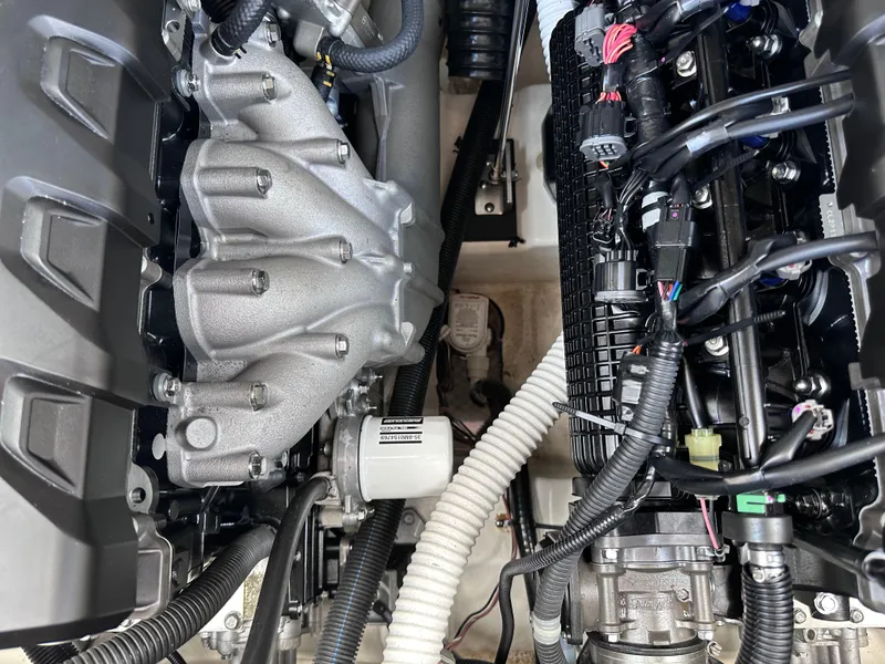 Slide: The Image of Close-up of 2021 Yamaha Boats 252 SD engine components. - 32