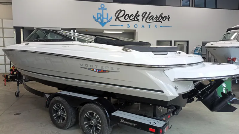 The Image of 2025 Monterey 224FS boat on trailer at Rock Harbor Boats showroom. - 0