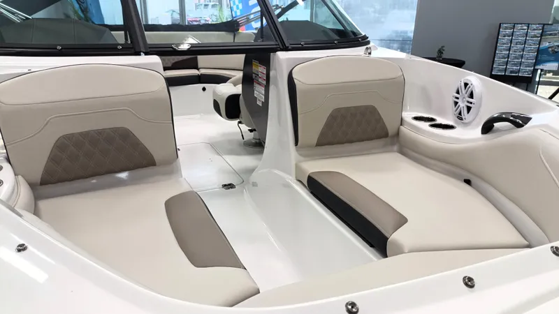 Slide: The Image of Interior of 2025 Monterey 224FS boat with beige seating and modern design. - 12