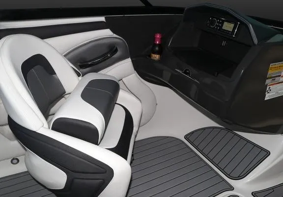 Slide: The Image of Interior of 2025 Monterey 224FS boat with modern seating and dashboard. - 19