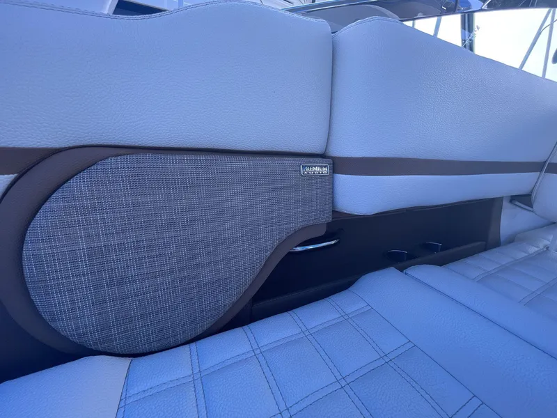Slide: The Image of 2021 Cobalt R30 boat interior with premium audio system and stylish seating. - 18