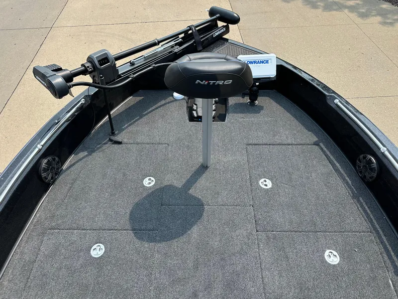 Slide: The Image of 2024 Nitro ZV19 Sport Pro fishing boat deck with trolling motor and seat. - 4