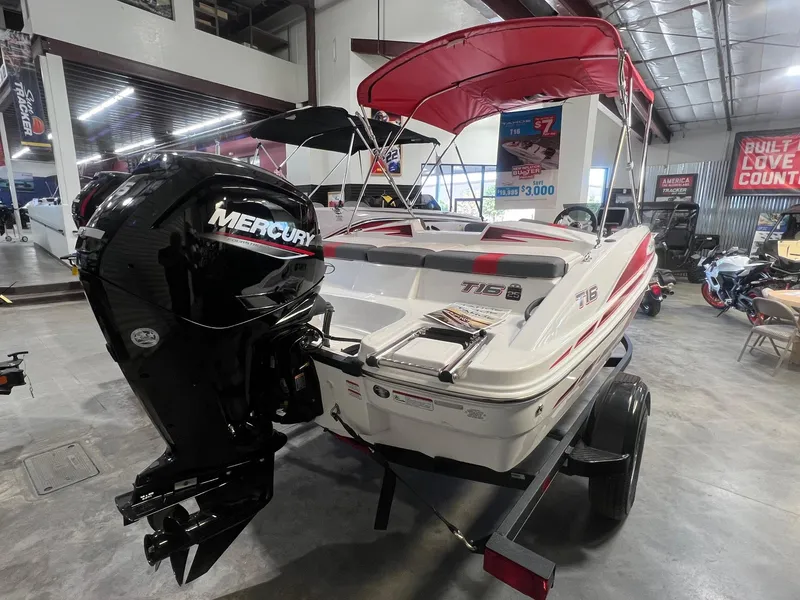 Slide: The Image of 2024 Tahoe T16 boat with Mercury outboard motor in showroom. - 4