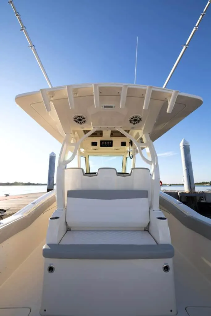 Slide: The Image of 2025 Scout 357 LXF boat interior with seating and helm station. - 9