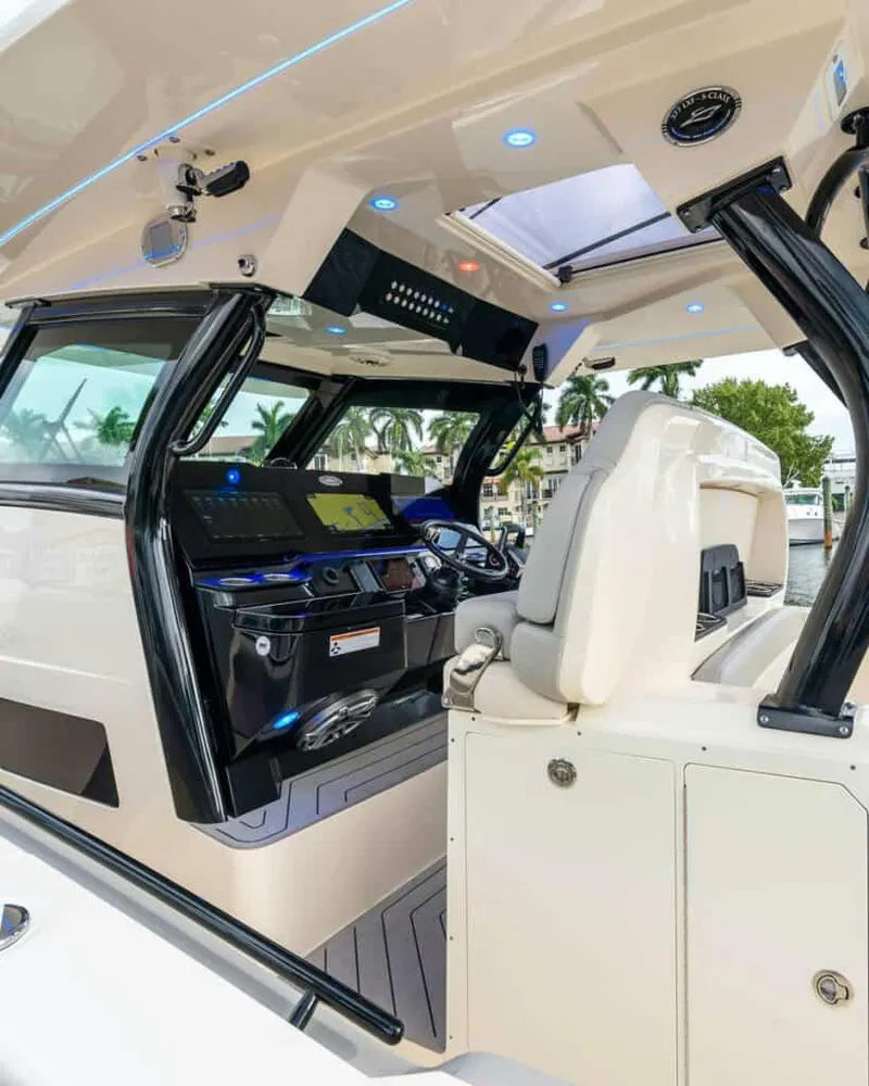 Slide: The Image of 2025 Scout 377 LXF boat cockpit with advanced navigation system. - 5