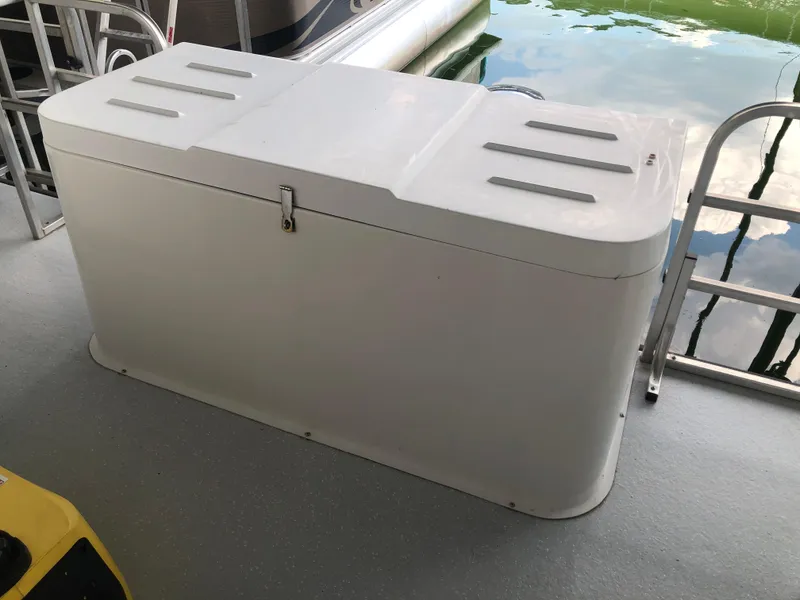 Slide: The Image of White storage box on the deck of a 2013 Catamaran Cruisers 39 boat. - 10