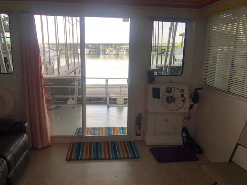 Slide: The Image of Interior view of 2013 Catamaran Cruisers 39 with sliding door to deck. - 17