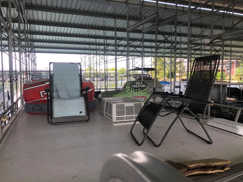 Slide: The Image of Upper deck of 2013 Catamaran Cruisers 39 with lounge chairs and inflatable raft. - 5