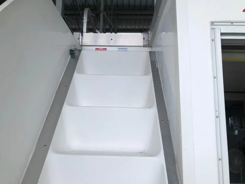 Slide: The Image of White stairs inside a 2013 Catamaran Cruisers 39 boat. - 6
