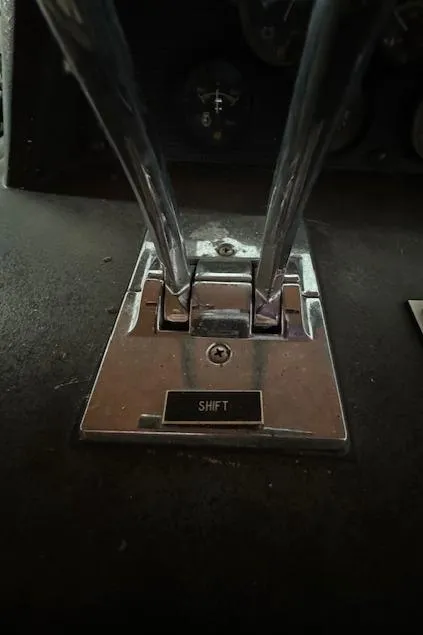 Slide: The Image of Close-up of 1986 Sea Ray 340 Express Cruiser shift controls. - 13