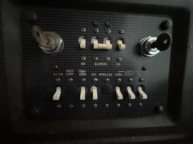 Slide: The Image of Control panel of a 1986 Sea Ray 340 Express Cruiser boat. - 22