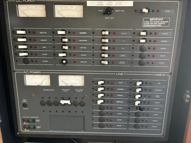 Slide: The Image of Electrical control panel on a 1997 Tiara Yachts 3100 Open boat. - 11