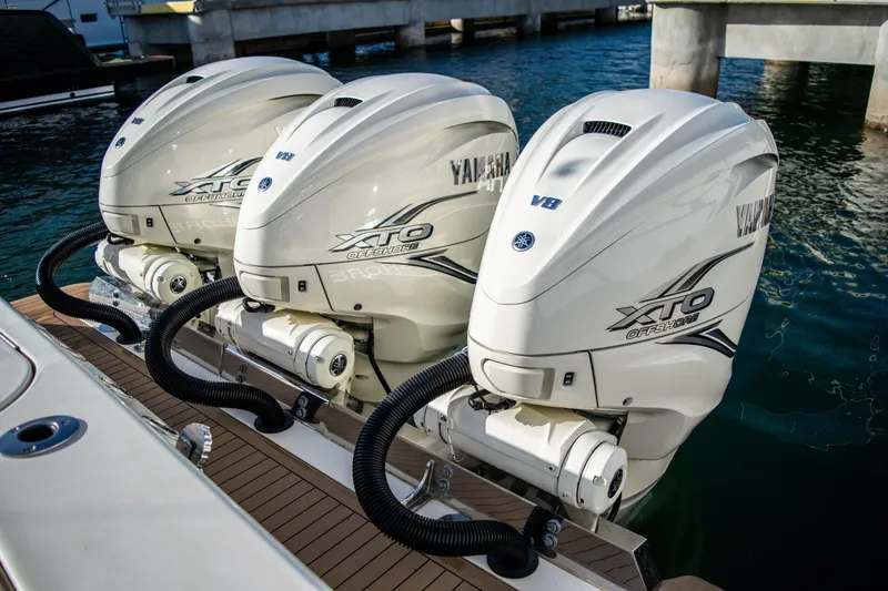 Slide: The Image of Triple Yamaha XTO outboard engines on a 2020 Scout 380 LXF boat. - 11