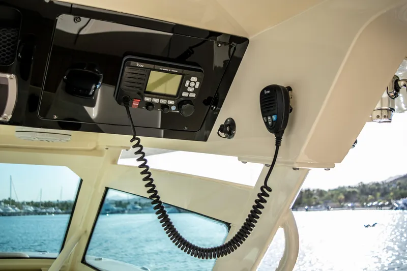 Slide: The Image of 2020 Scout 380 LXF boat communication system with radio and microphone. - 24