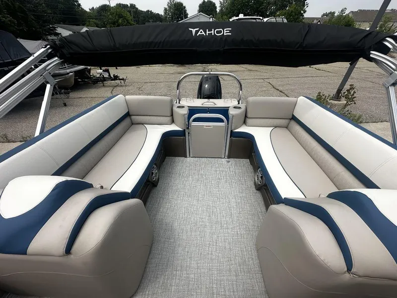 Slide: The Image of 2024 Tahoe CASCADE 2385 QL pontoon boat interior with spacious seating and modern design. - 1