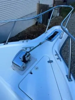 Slide: The Image of 1998 Pursuit 2800 Offshore boat bow with anchor windlass. - 28