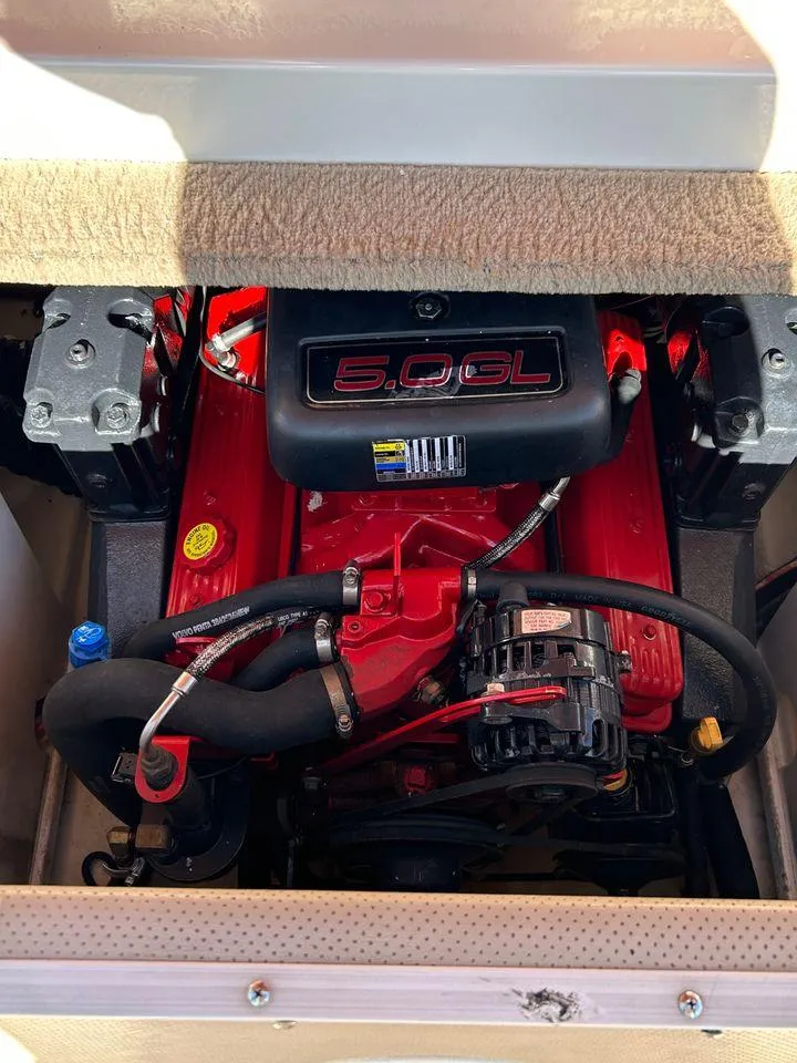 Slide: The Image of 2006 Chaparral 210 SSi boat engine, 5.0L V8, red and black components. - 12