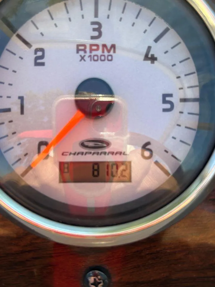 Slide: The Image of Close-up of 2006 Chaparral 210 SSi tachometer showing 810.2 hours. - 13