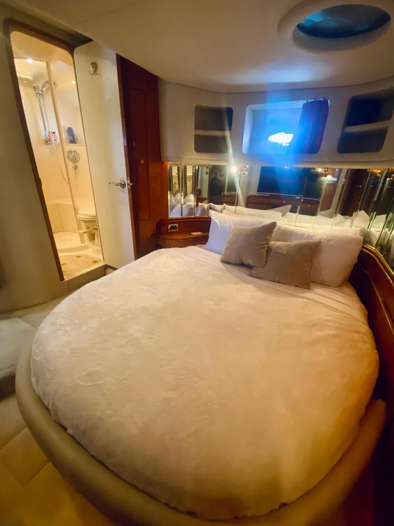 Slide: The Image of Luxurious bedroom in 2001 Sea Ray 540 Sundancer yacht with ensuite bathroom. - 21