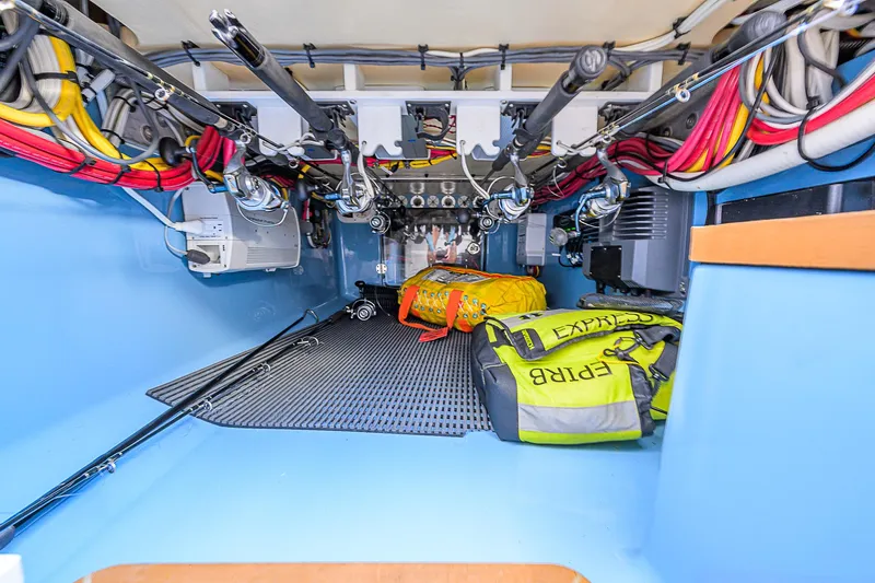 Slide: The Image of Interior view of 2019 Bahama 41 boat showing storage and equipment area. - 34
