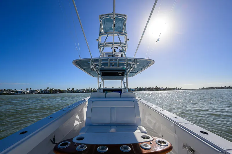 Slide: The Image of 2019 Bahama 41 boat on water, sunny day, clear sky, view from deck. - 35