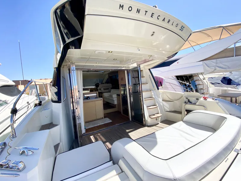 Slide: The Image of Luxury Monte Carlo MC5S yacht, 2015 model, featuring spacious deck and elegant interior. - 3