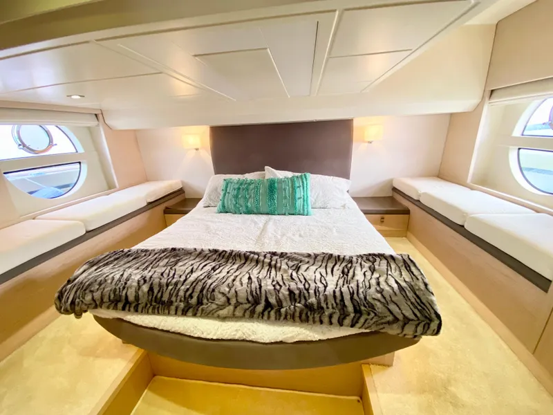 Slide: The Image of Luxurious 2015 Monte Carlo MC5S yacht bedroom with elegant bedding and ambient lighting. - 35