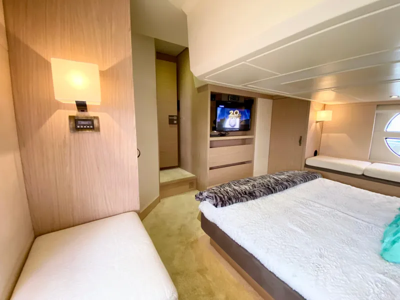 Slide: The Image of Luxurious Monte Carlo MC5S 2015 yacht interior with cozy bedroom and modern amenities. - 39
