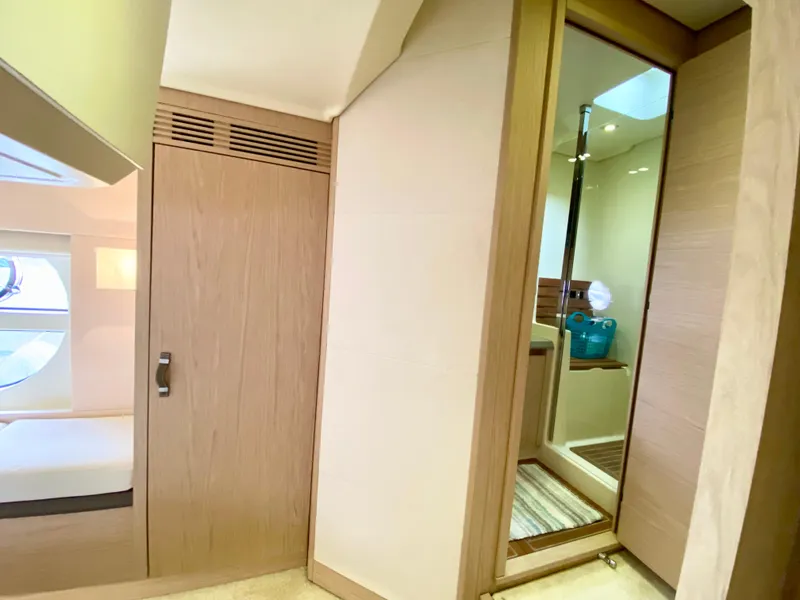 Slide: The Image of Luxurious interior of 2015 Monte Carlo MC5S yacht with modern wood finishes. - 42