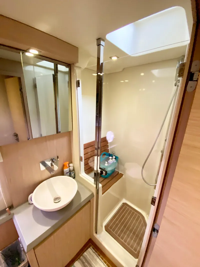 Slide: The Image of 2015 Monte Carlo MC5S yacht bathroom with modern sink and shower. - 43