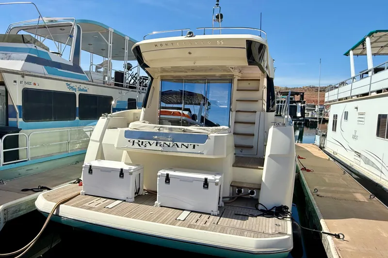 Slide: The Image of Luxury Monte Carlo MC5S yacht docked at marina, rear view, 2015 model. - 63