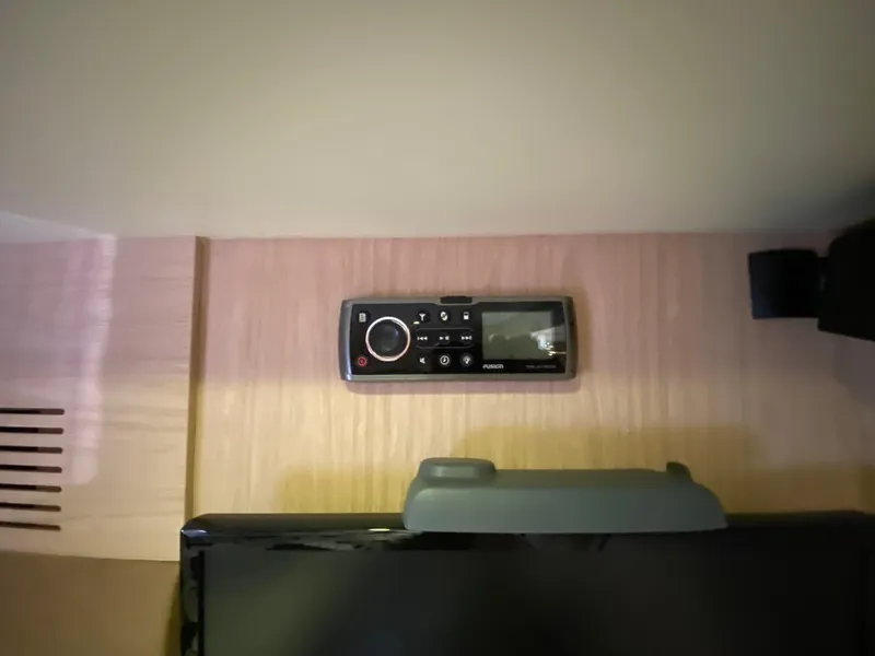 Slide: The Image of Remote control on wooden surface in Monte Carlo MC5S, 2015 model. - 34