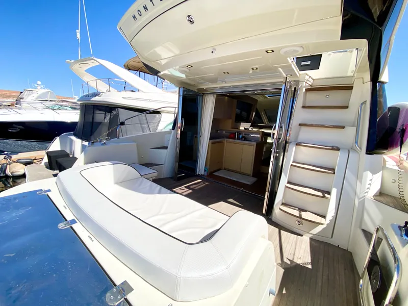 Slide: The Image of Luxurious 2015 Monte Carlo MC5S yacht interior with open deck and modern amenities. - 4