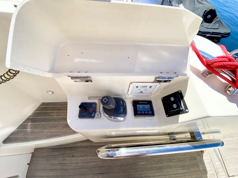 Slide: The Image of Control panel of a 2015 Monte Carlo MC5S yacht with various navigation instruments. - 7