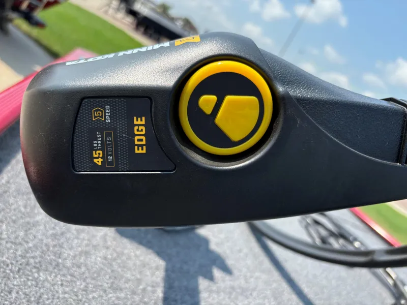 Slide: The Image of Close-up of 2024 Tracker Bass Tracker Classic XL boat control panel. - 6