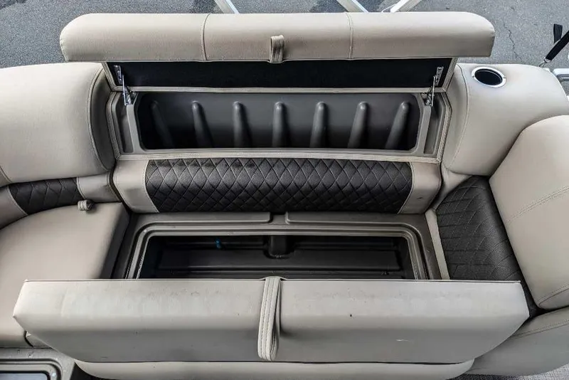 Slide: The Image of 2024 Sun Tracker Party Barge 20 DLX storage compartments and seating. - 13